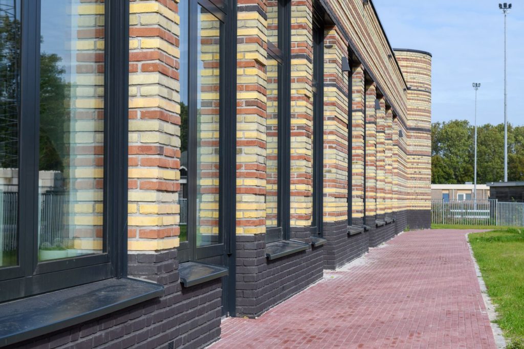 Ontmoetingsschool de Oanrin achterzijde - Arum - gevelontwerp - Aberson