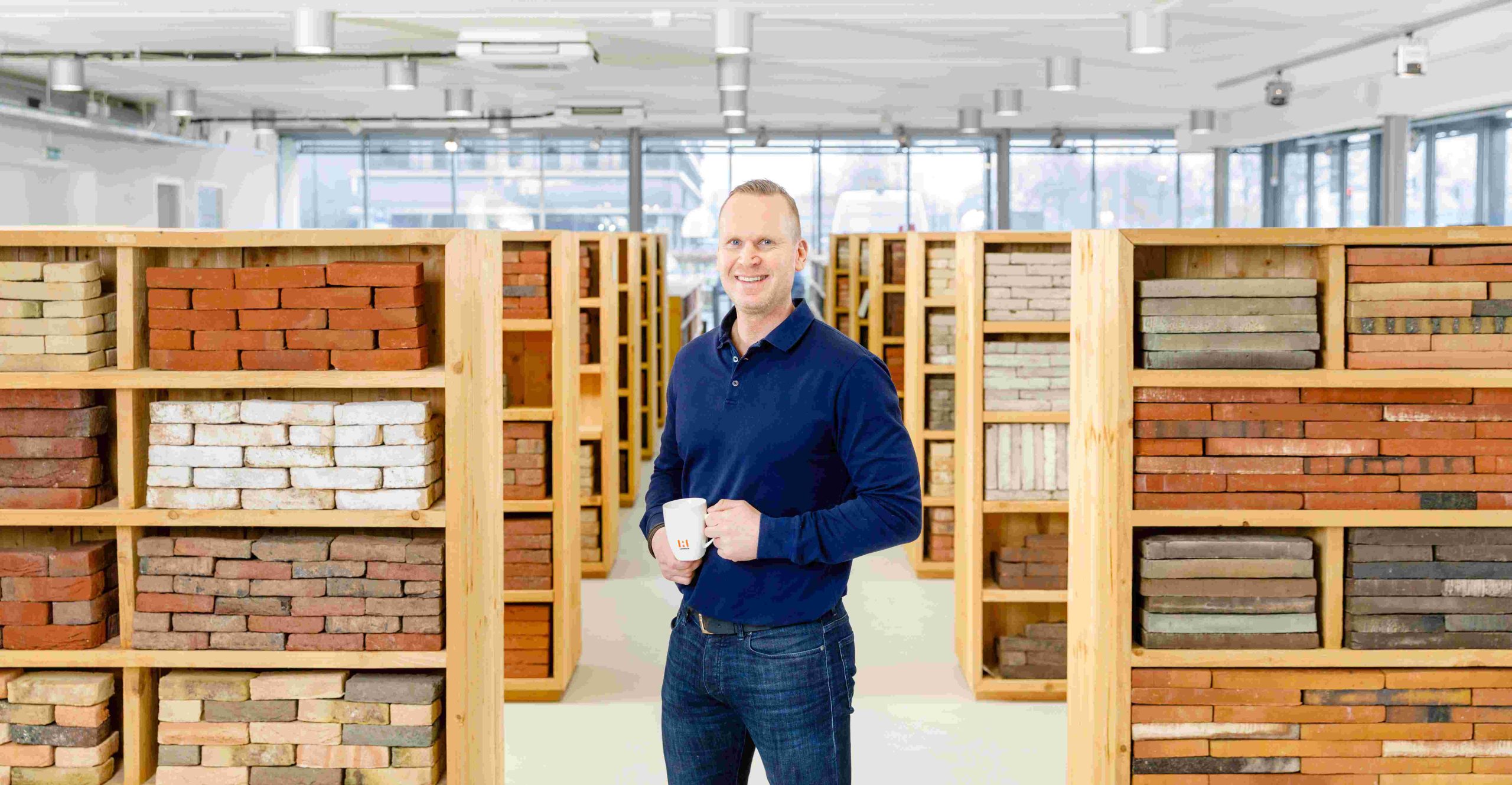 John Mutsaers in showroom Breda